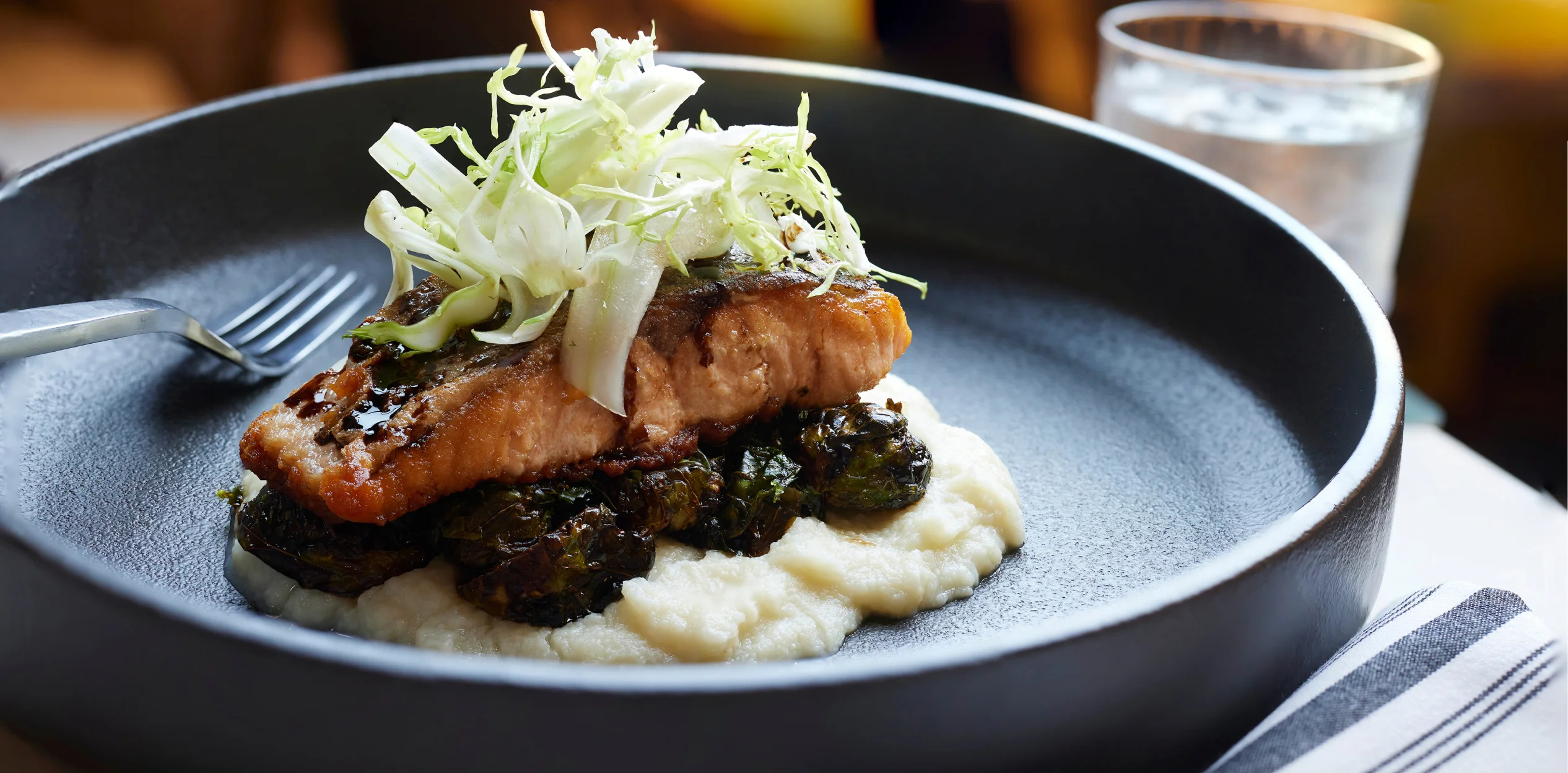 close-up of chicken and mash potatoes on plate