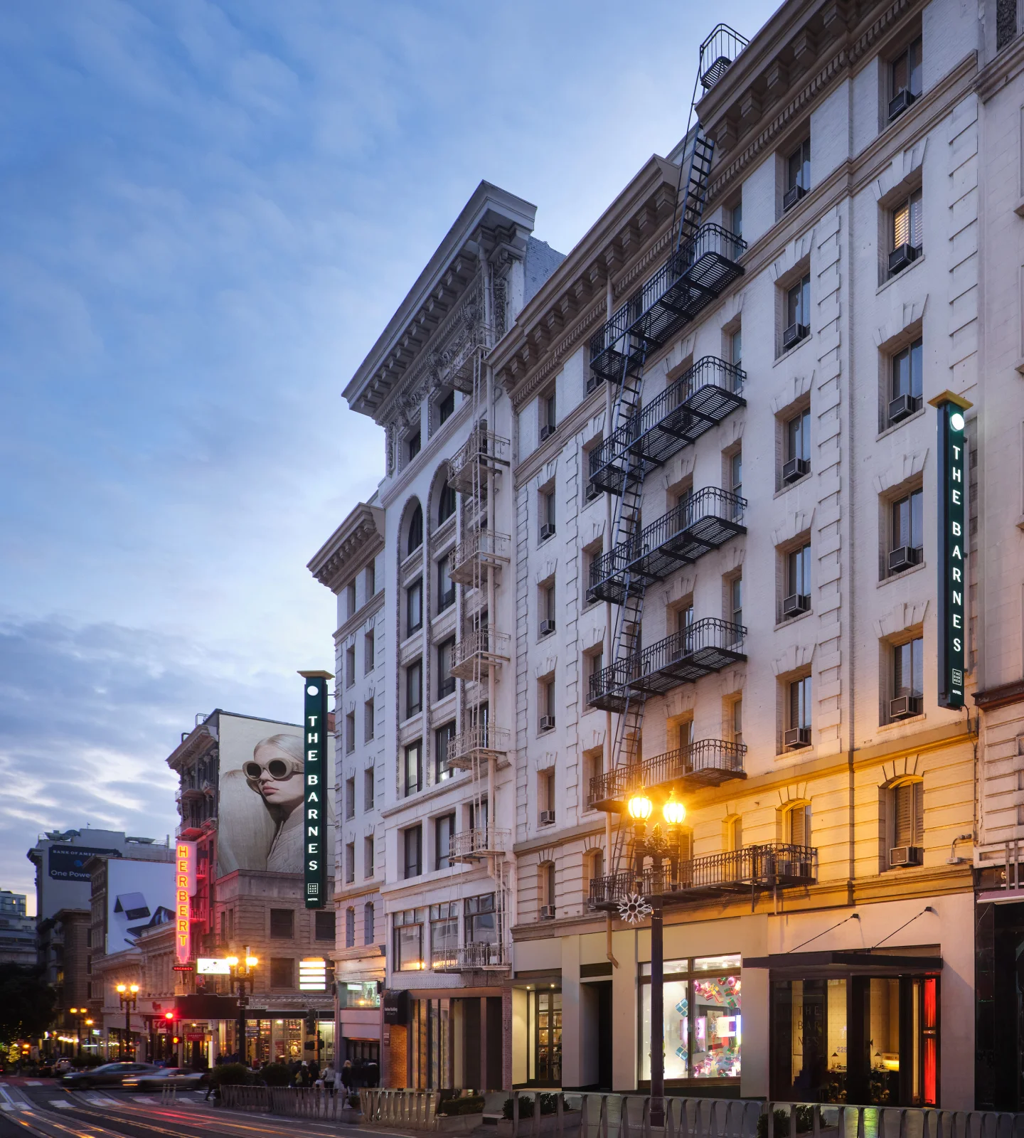 exterior view of the barnes hotel during the evening time